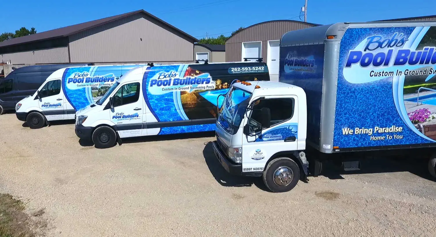 Bobs-Fleet-Picture Vans and Trucks with Bob's Logo on side.